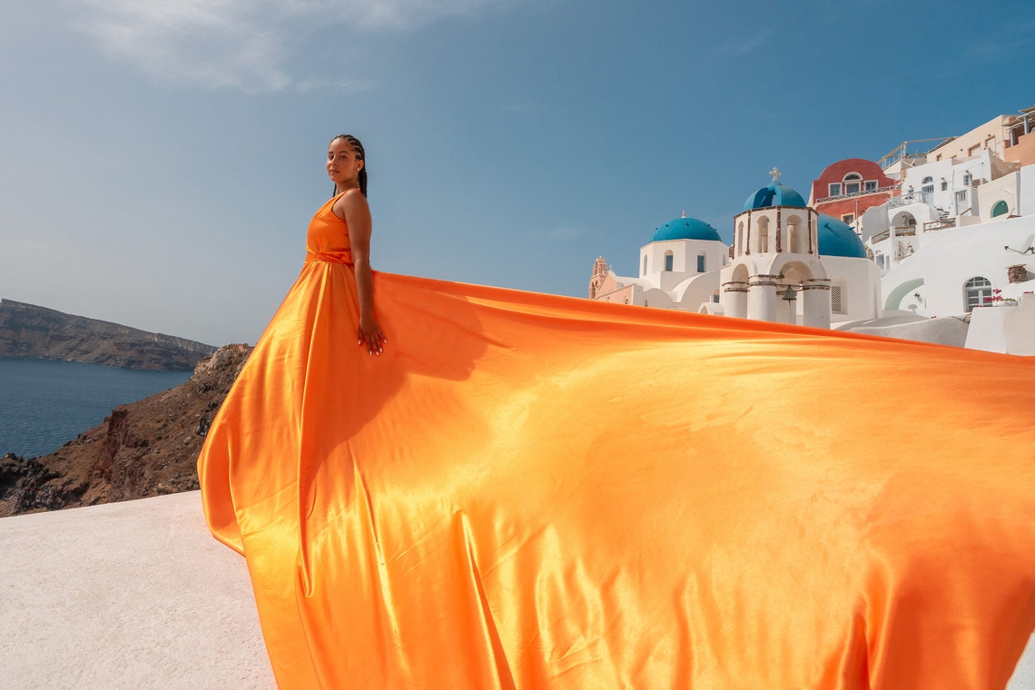 Long Train "Flying" dress, perfect for a photoshoot on the beach or at your travel location! Rent That Dress.US Long Train "Flying" dress, perfect for a photoshoot on the beach or at your travel location! Rent That Dress.US